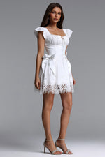 Load image into Gallery viewer, Henrietta Resort Flowy Short Sleeve Bow Ruched Woven Mini Dress	