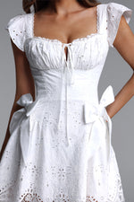 Load image into Gallery viewer, Henrietta Resort Flowy Short Sleeve Bow Ruched Woven Mini Dress	